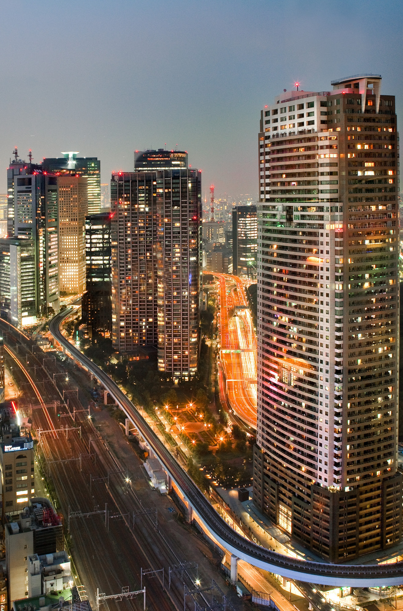 Night cityscape with high-rise buildings