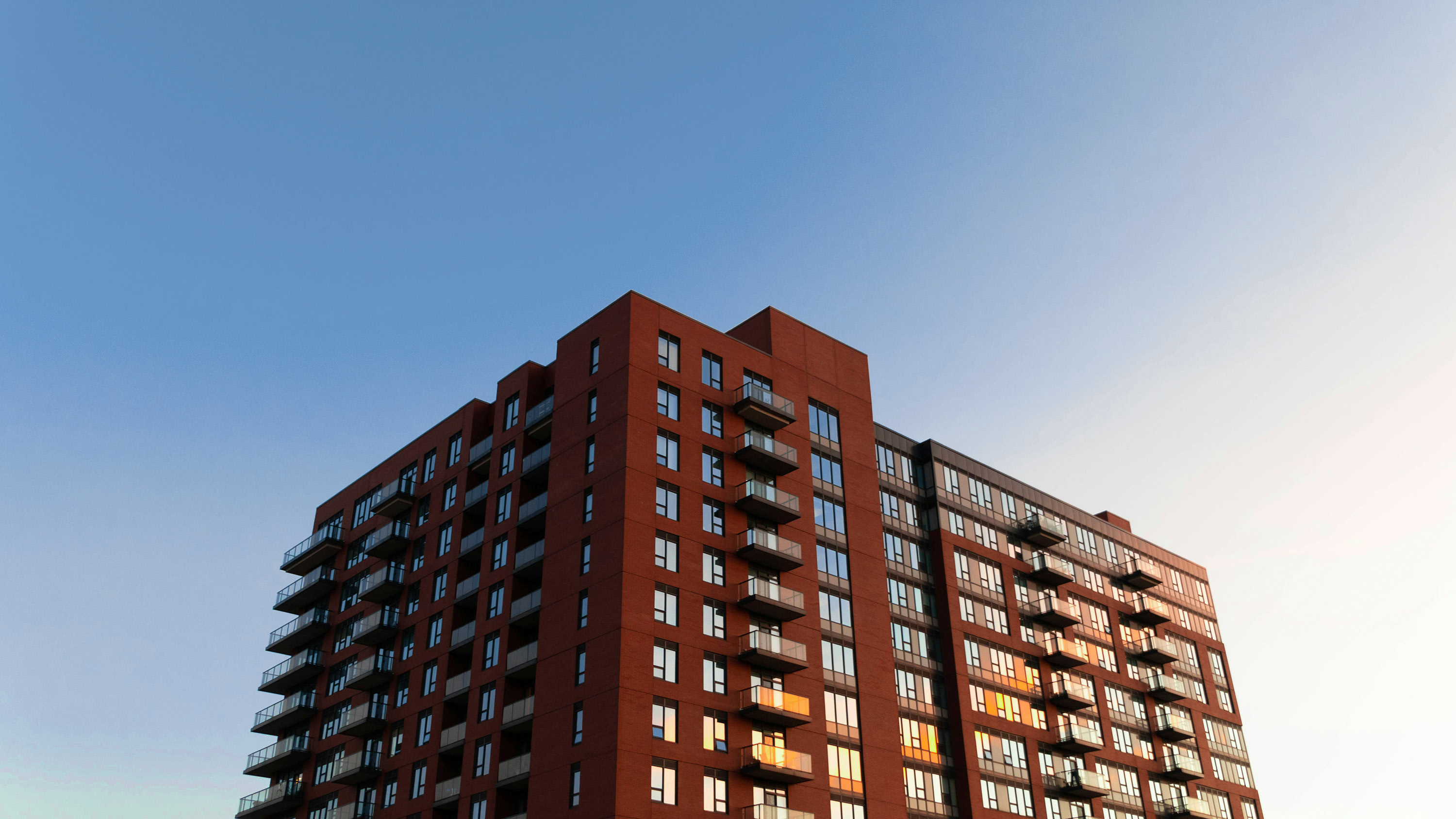 Modern residential building against a clear sky
